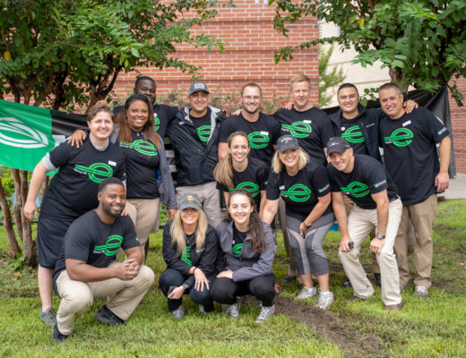 Enterprise employees gathered for a group photo during a planting event in Belaire, Texas